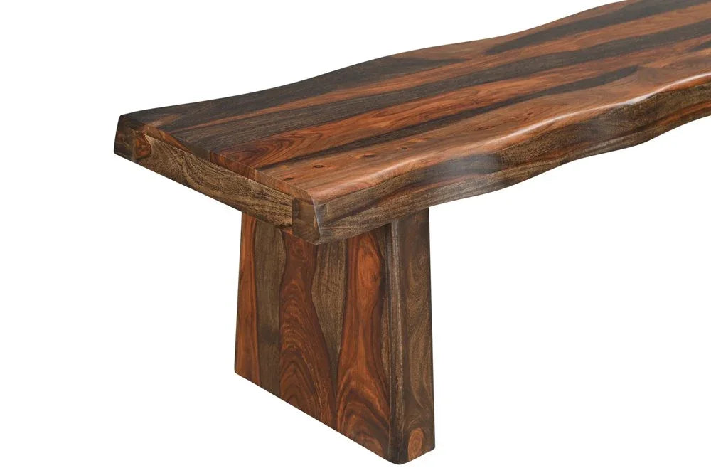 Close up detailed view highlighting the rich dark brown grain patterns and wavy live edge of a premium solid wood dining bench