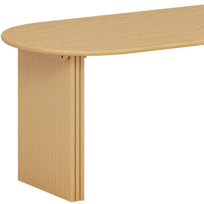 Wide detail view of oval tabletop and fluted pedestal base on solid wood double pedestal oval dining table in natural oak finish showing full base height and wood grain texture
