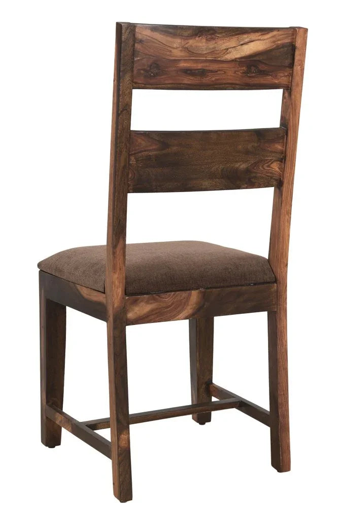 Three quarter rear view of a handmade premium quality solid wood ladder back dining chair with a brown upholstered cushioned seat isolated on a white background