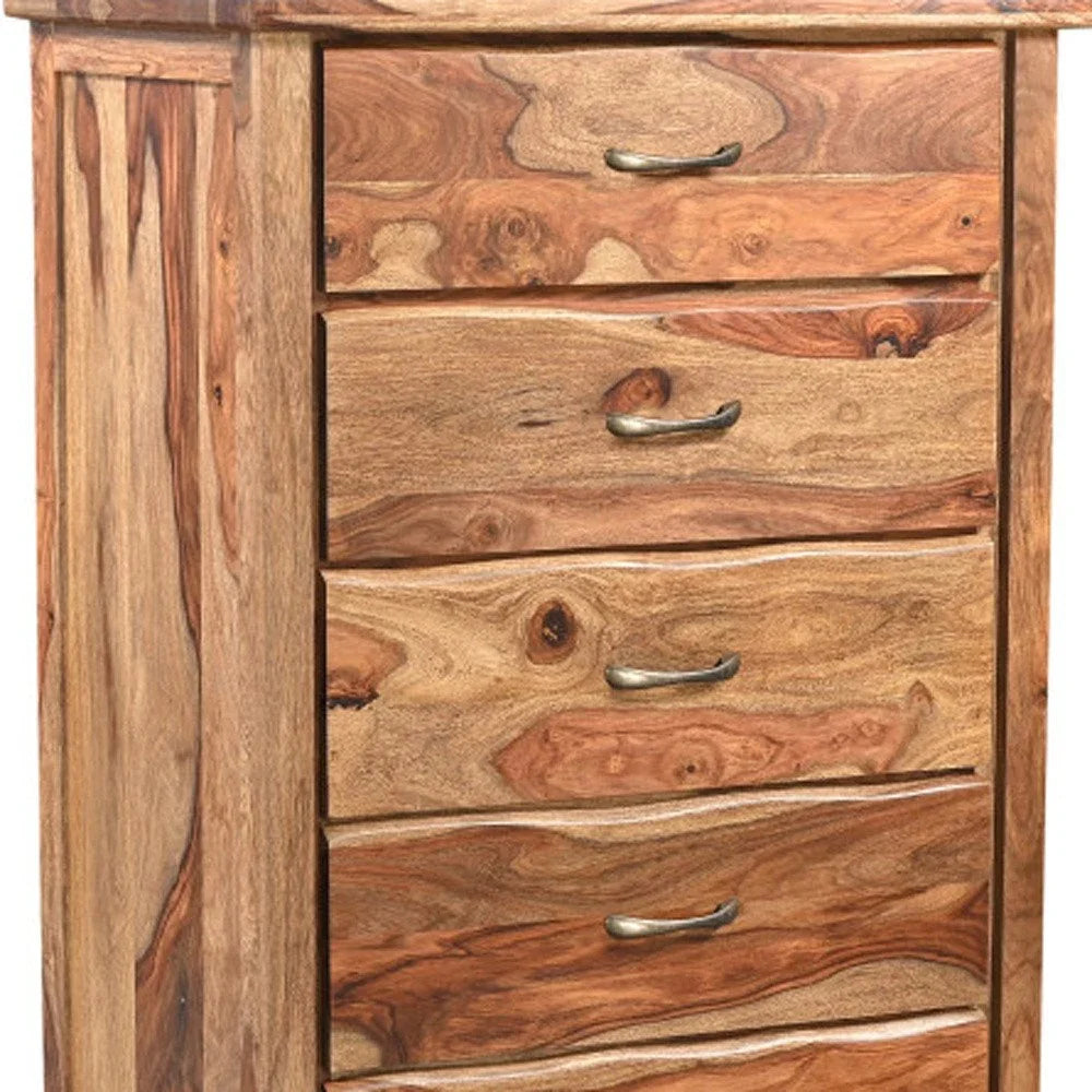 Upper four drawer faces of solid wood live edge chest showing auburn sheesham grain natural knots and antique brass cup pulls