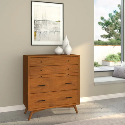 Solid mahogany four-drawer chest styled in living space with ceramic vases abstract art mixed hardware and splayed tapered legs