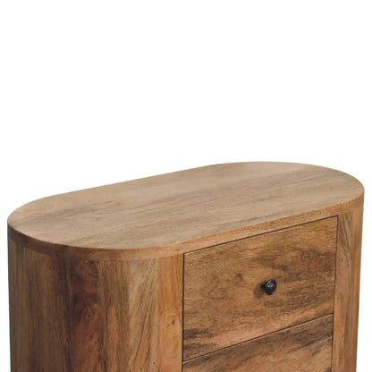 Oval top surface detail of solid wood mini cabinet showing smooth mango wood grain rounded edges and curved body
