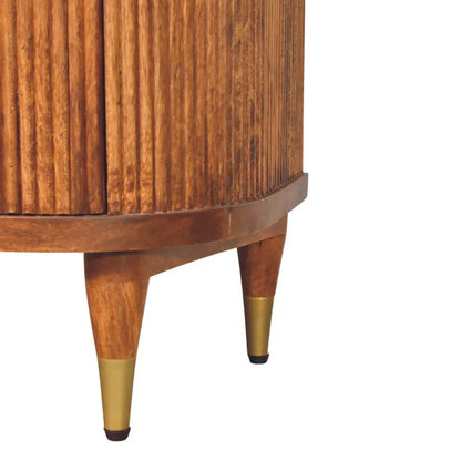 Solid Wood Ribbed Bedside Brass Accents brass-capped tapered leg close-up hardware detail amber oak base