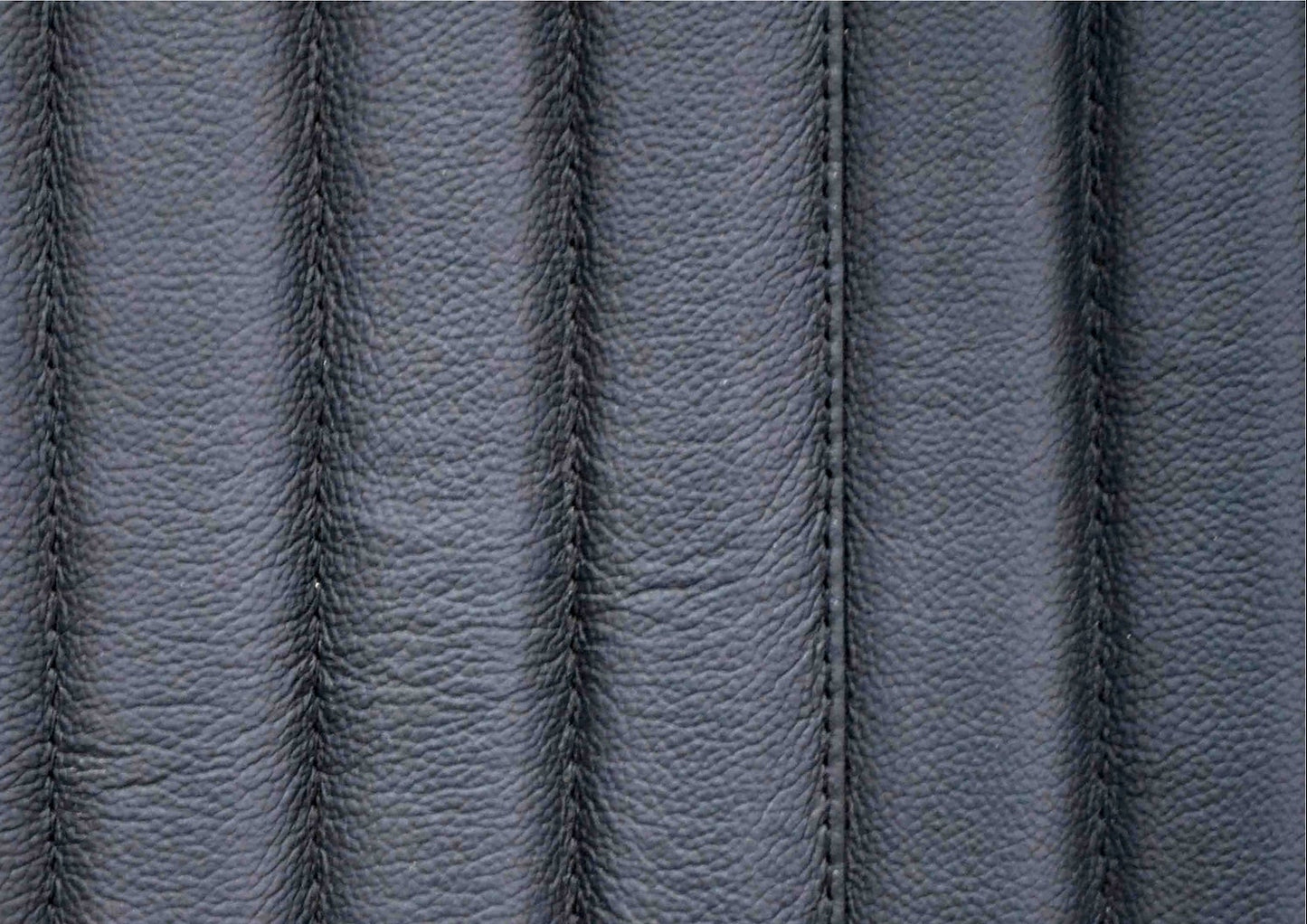 Stanford Fluted Two-Drawer Leather Nightstand black genuine leather fluted texture close up detail stitching