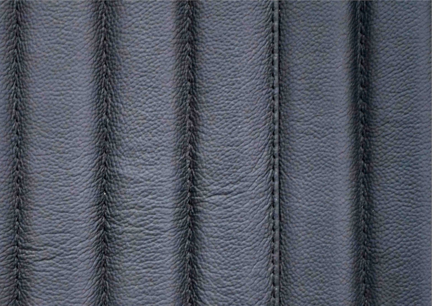 Stanford Fluted Two-Drawer Leather Nightstand black genuine leather fluted texture close up detail stitching