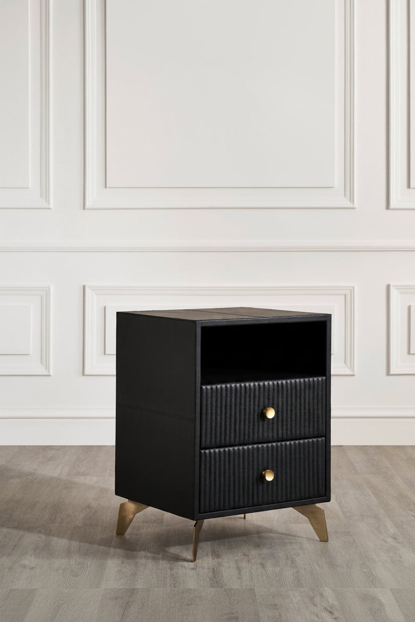 Stanford Fluted Two-Drawer Leather Nightstand black open shelf brass knobs brass legs white paneled wall angled view