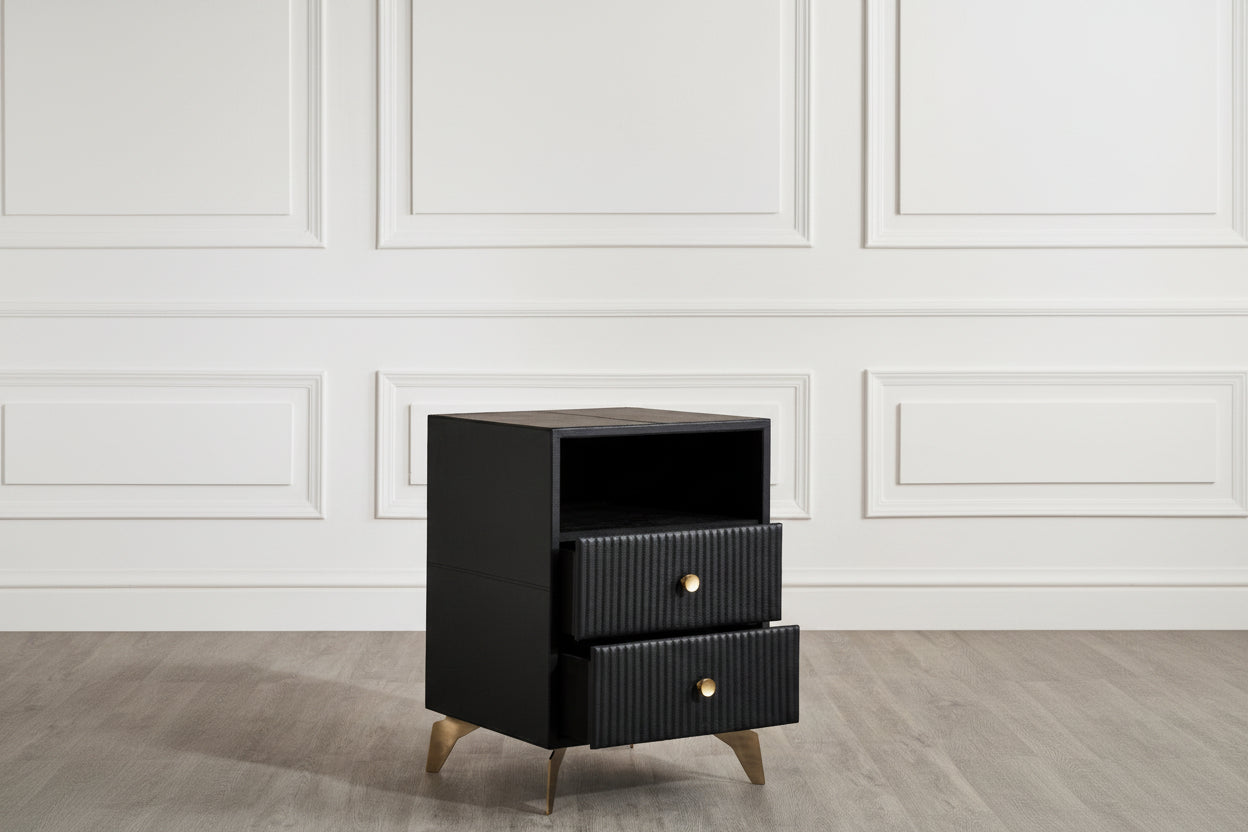 Stanford Fluted Two-Drawer Leather Nightstand black open shelf brass knobs brass legs side view white paneled wall