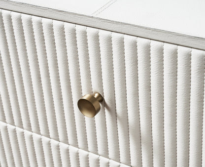 Stanford Fluted Two-Drawer Leather Nightstand white fluted leather brass knob close up drawer detail angled view