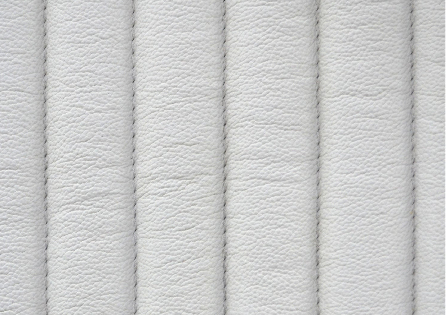Stanford Fluted Two-Drawer Leather Nightstand white genuine leather fluted texture close up detail