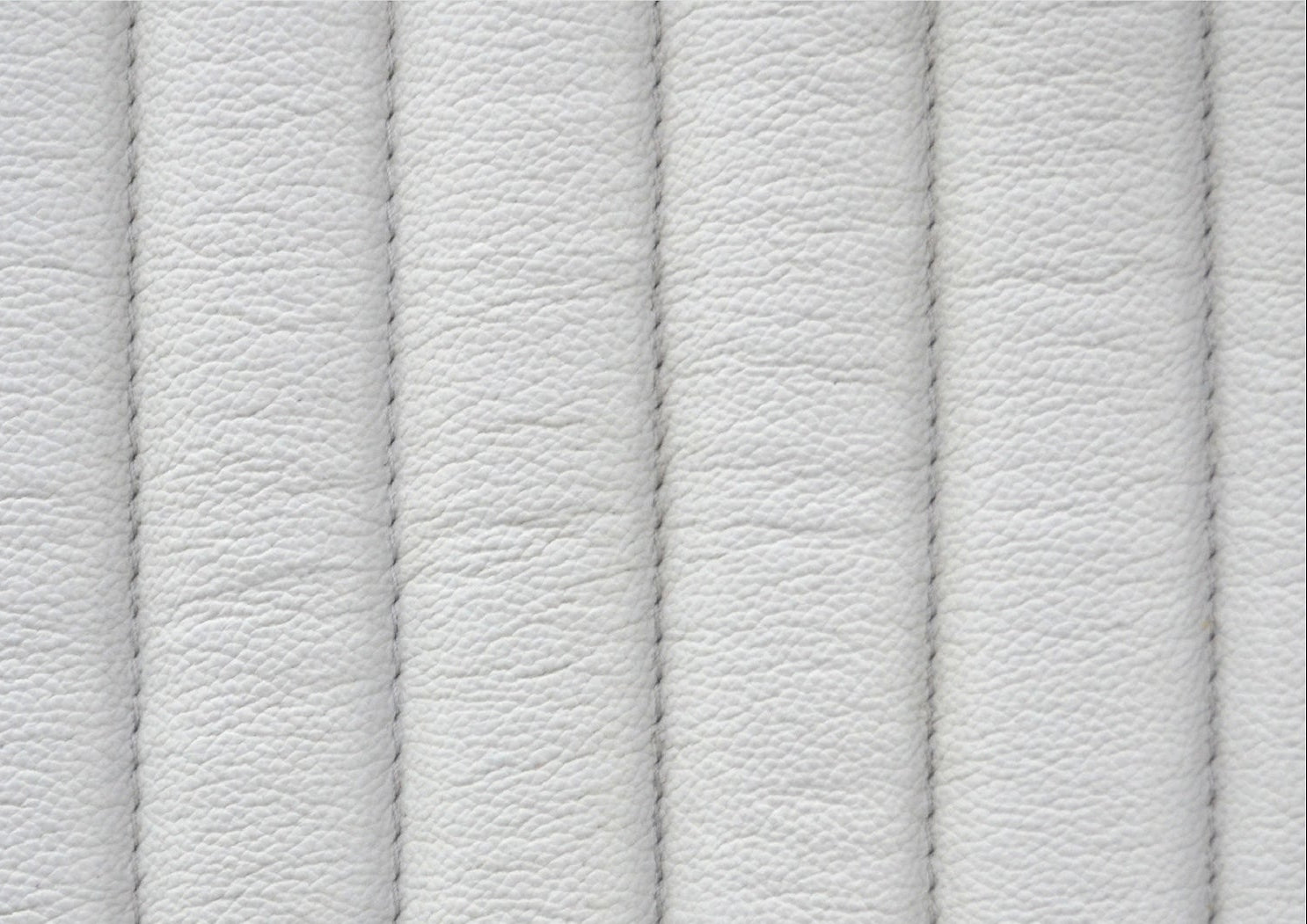 Stanford Fluted Two-Drawer Leather Nightstand white genuine leather fluted texture close up detail