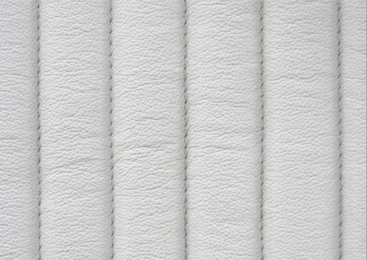Stanford Genuine Leather Ribbed Headboard white top grain leather surface closeup showing natural texture and vertical ribbed stitching detail