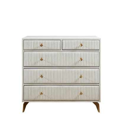 Stanford Ribbed Five-Drawer Leather Chest in white genuine leather front-facing view showing full ribbed drawer fronts, solid brass knobs, and angled brass legs against white background