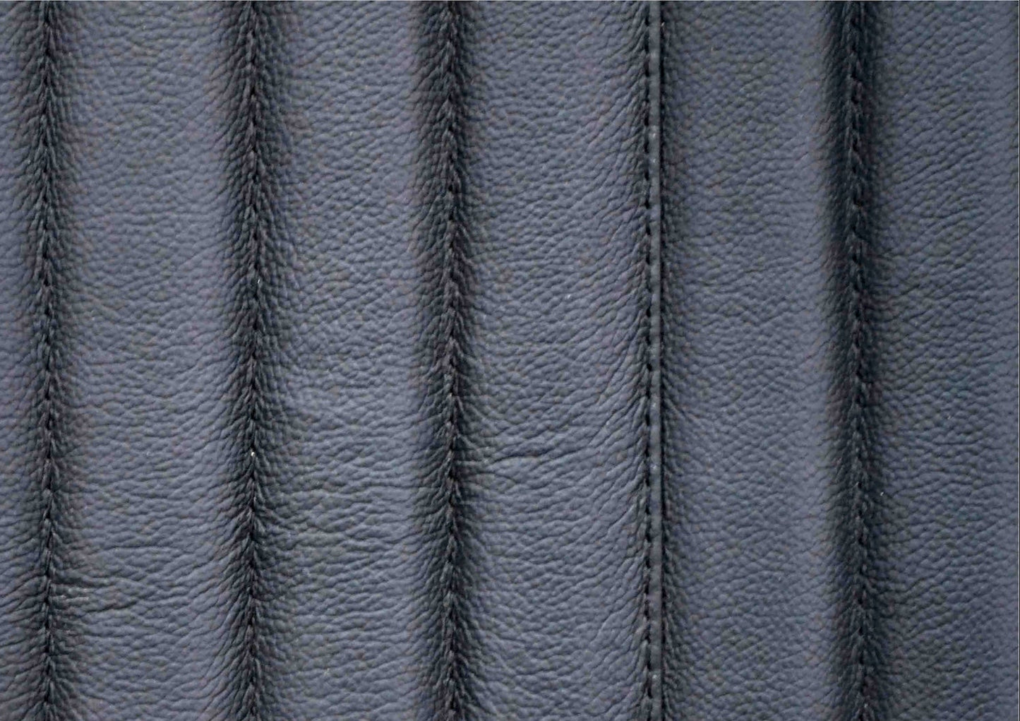 Stanford Ribbed Six-Drawer Leather Dresser black genuine leather vertical ribbing stitching texture macro close-upp