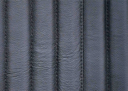 Stanford Ribbed Six-Drawer Leather Dresser black genuine leather vertical ribbing stitching texture macro close-upp