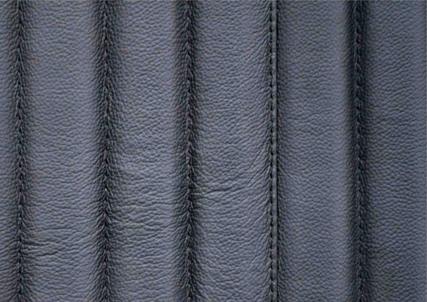 Stanford Round Fluted Leather Nightstand black genuine leather fluted texture close up detail stitching