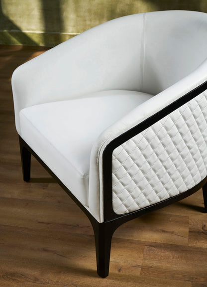 Top-Grain Leather Lounge Chair white diamond quilting side detail hardwood legs angled view 