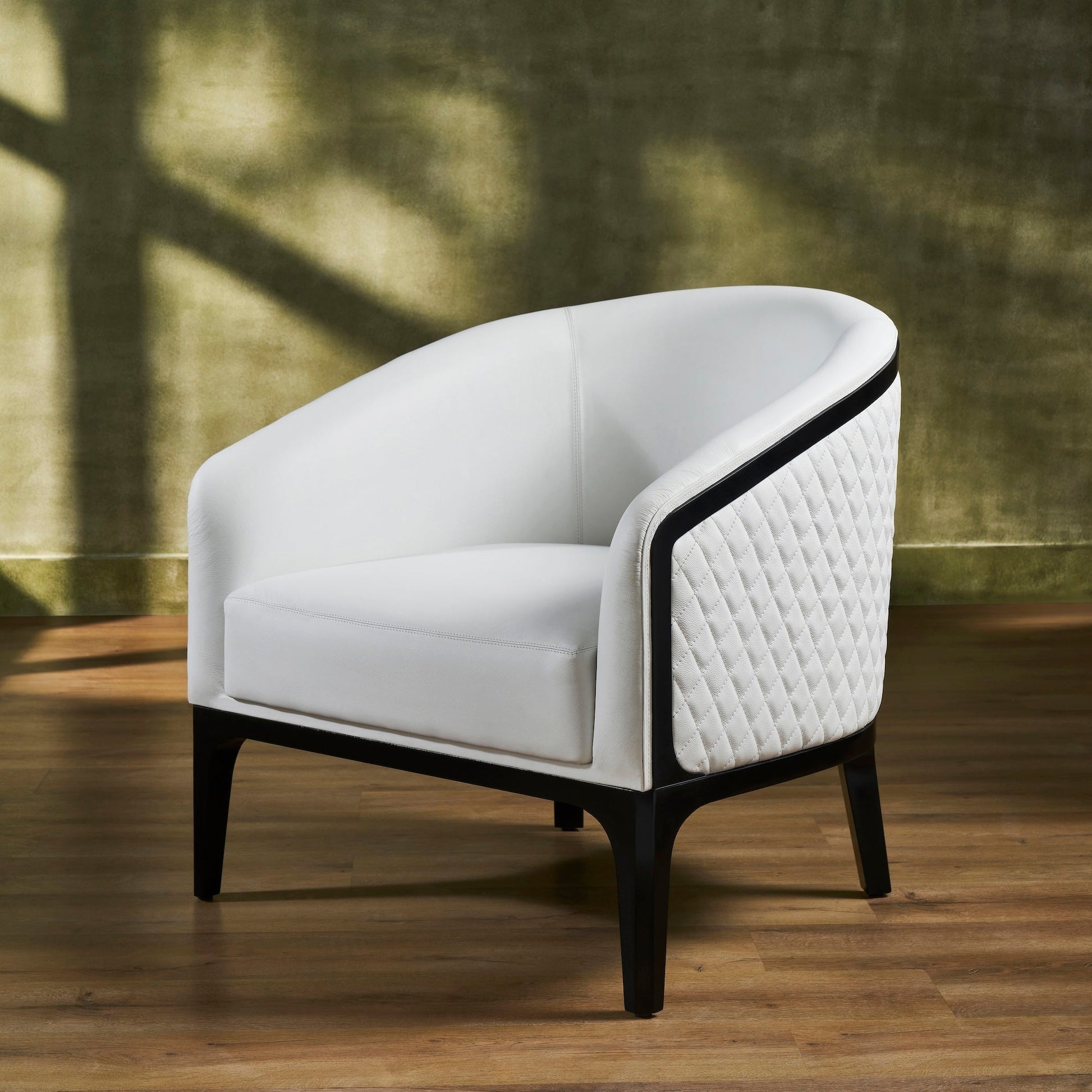 Top-Grain Leather Lounge Chair white three quarter view diamond quilting hardwood legs natural light 