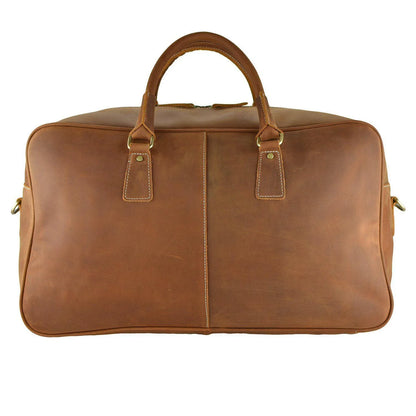 WANDERLUST Roadster leather travel bag British Tan front view showing structured cowhide body dual top handles and gold tone zipper hardware

