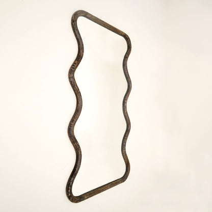 Close-up of wavy mango wood wall mirror frame showing brown antique finish texture and handcrafted wood grain detail against neutral background

wavy-mango-wood-wall-mirror-frame-close-up-brown-antique-finish-texture-handcrafted-wood-grain-detail