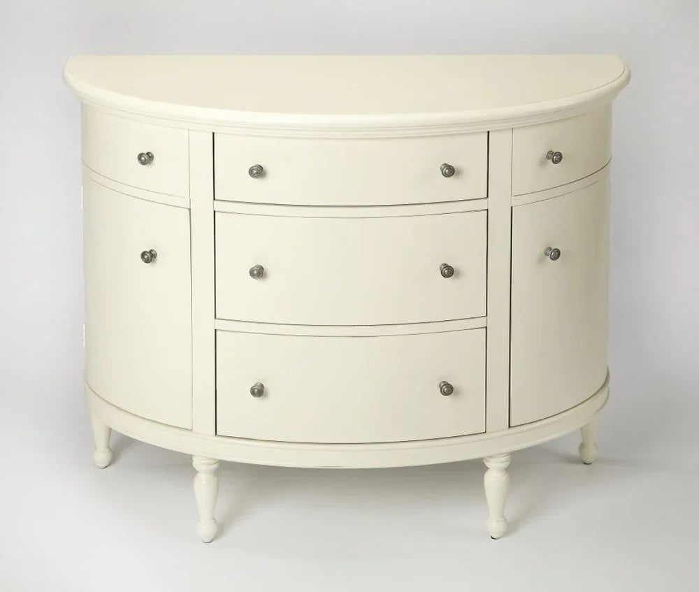 A full front view of the White Demilune Console Chest against a white background, showcasing its classic curved silhouette and solid wood construction.