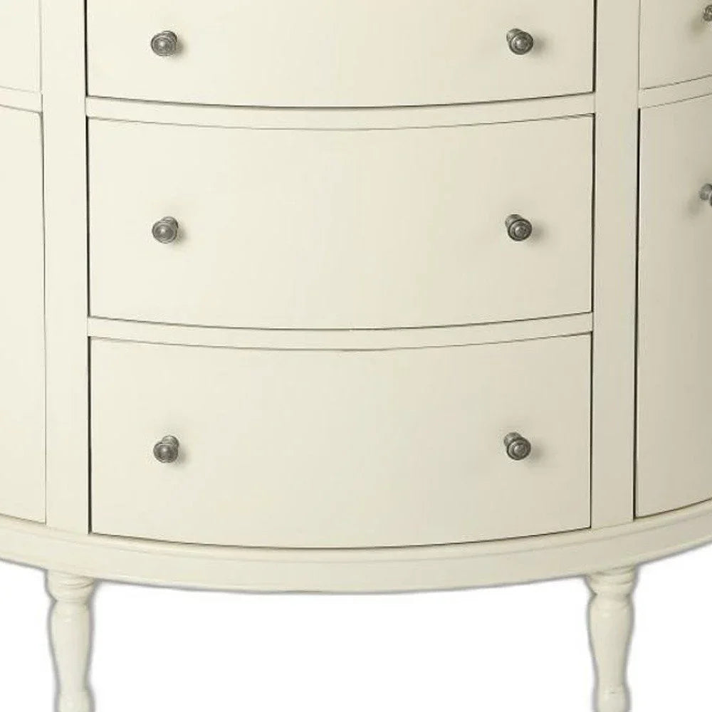 A detailed close-up of the White Demilune Console Chest showing the crisp white finish and decorative metallic drawer knobs.