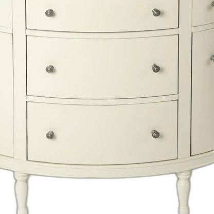 A detailed close-up of the White Demilune Console Chest showing the crisp white finish and decorative metallic drawer knobs.