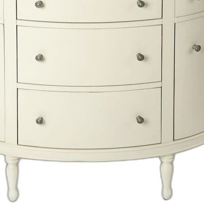 A low-angle close-up of the White Demilune Console Chest highlighting the elegant turned legs and smooth traditional white finish.
