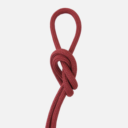 Dark red paracord knot detail of the Wrap hanging kit against a clean white background

