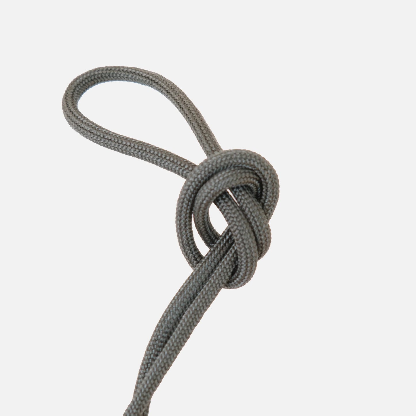 Sage paracord knot detail of the Wrap hanging kit against a clean white background

